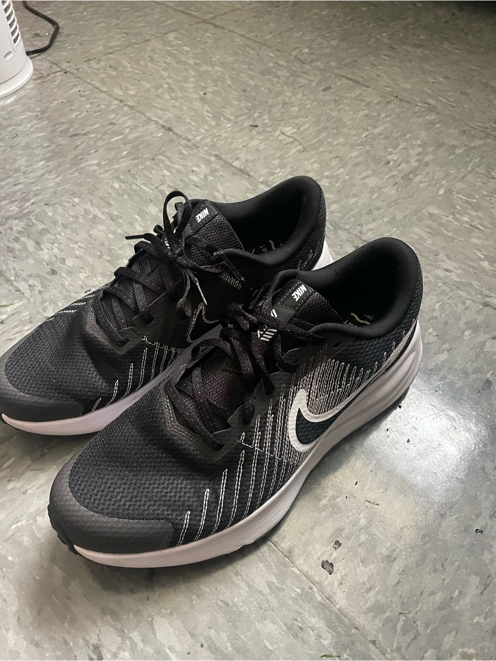 Nike Men’s Black Athletic Running Shoes with White Swoosh